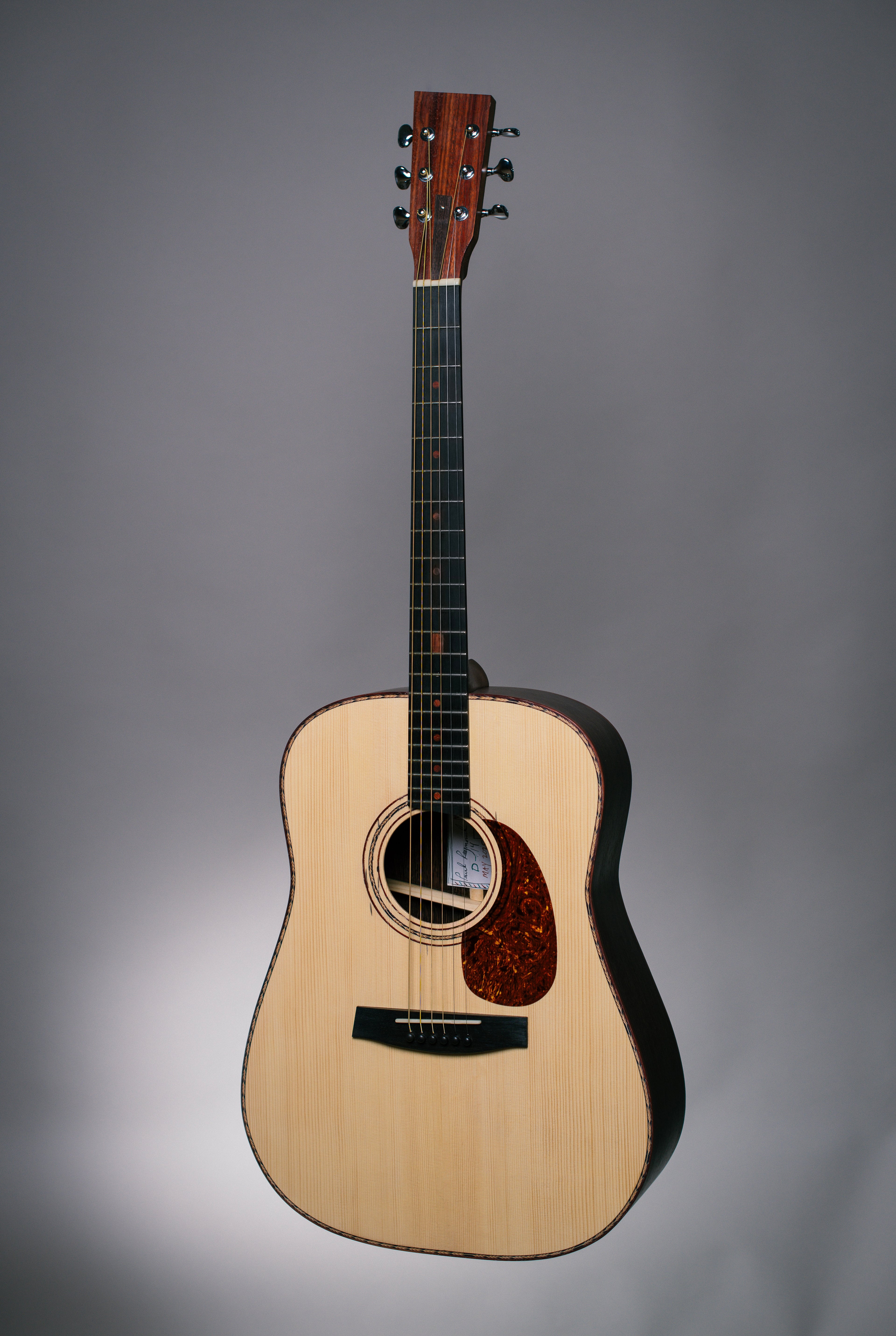 Raymond Guitars Dreadnought handmade acoustic guitar with Wenge back and sides and Adirondack Spruce top