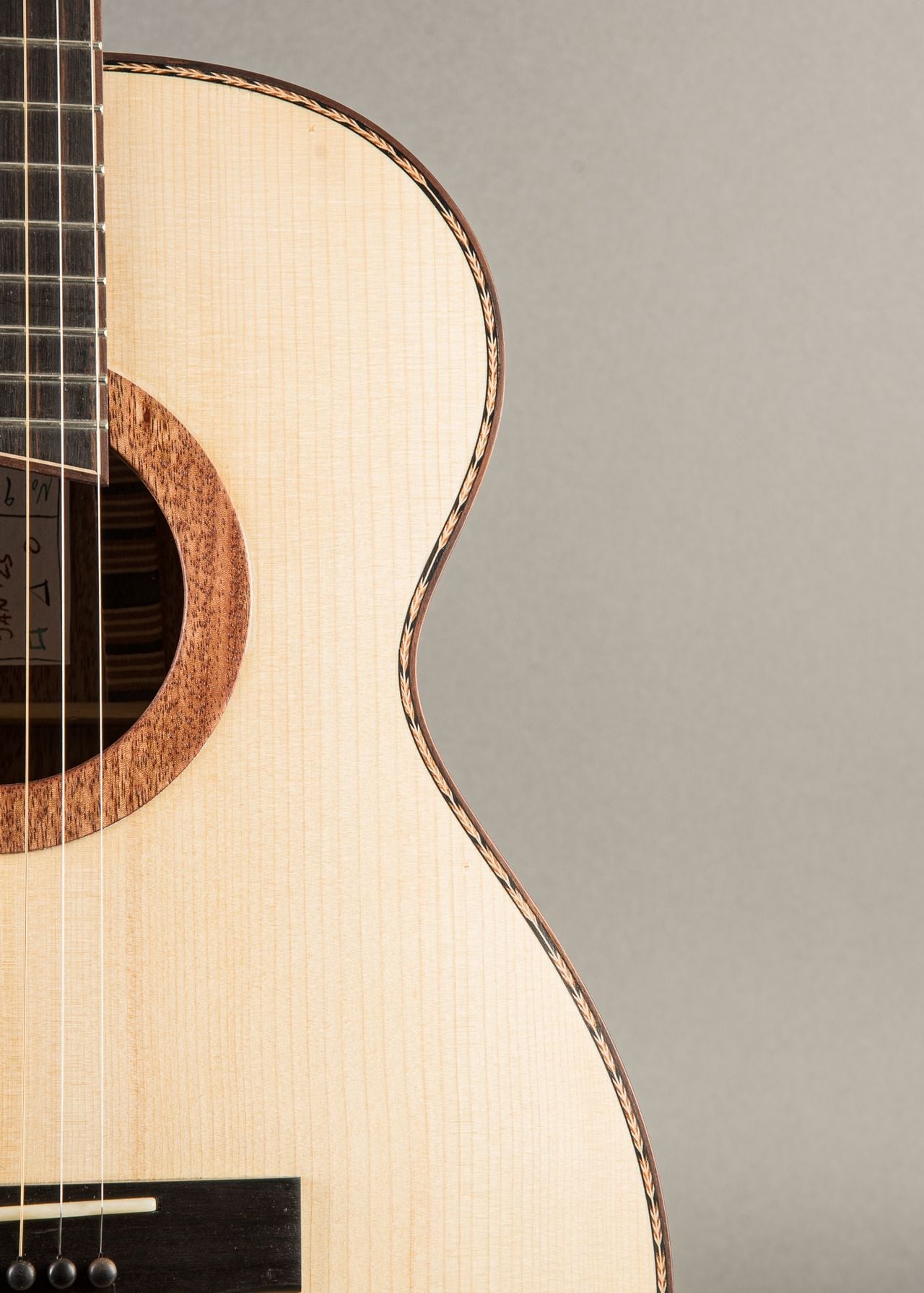 Raymond Guitars OM12 Gombe Build handmade acoustic guitar with Gombe back and sides and Adirondack Spruce top