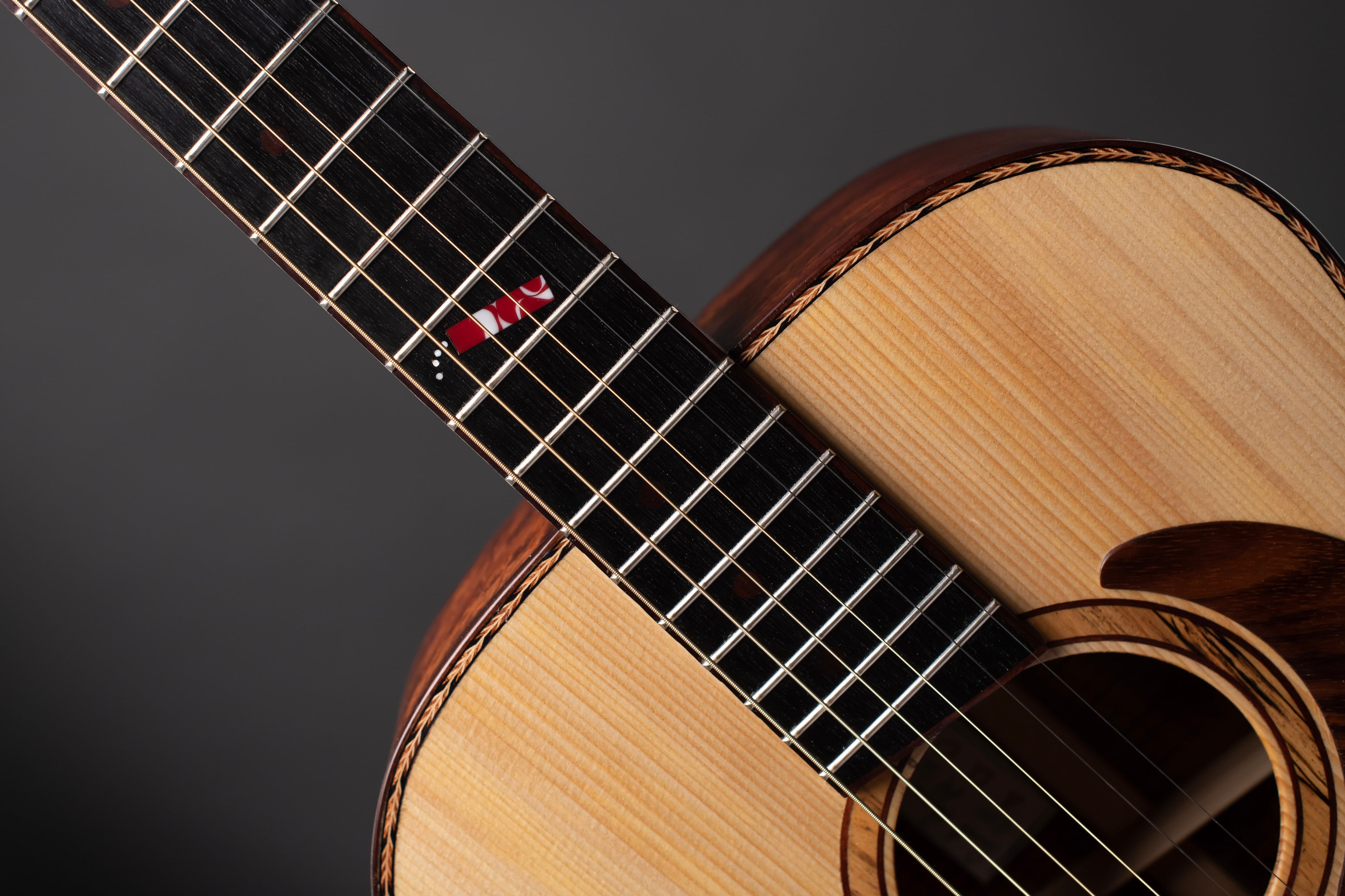 Raymond Guitars OM14 Firecracker handmade acoustic guitar with Koa back and sides and Adirondack Spruce top