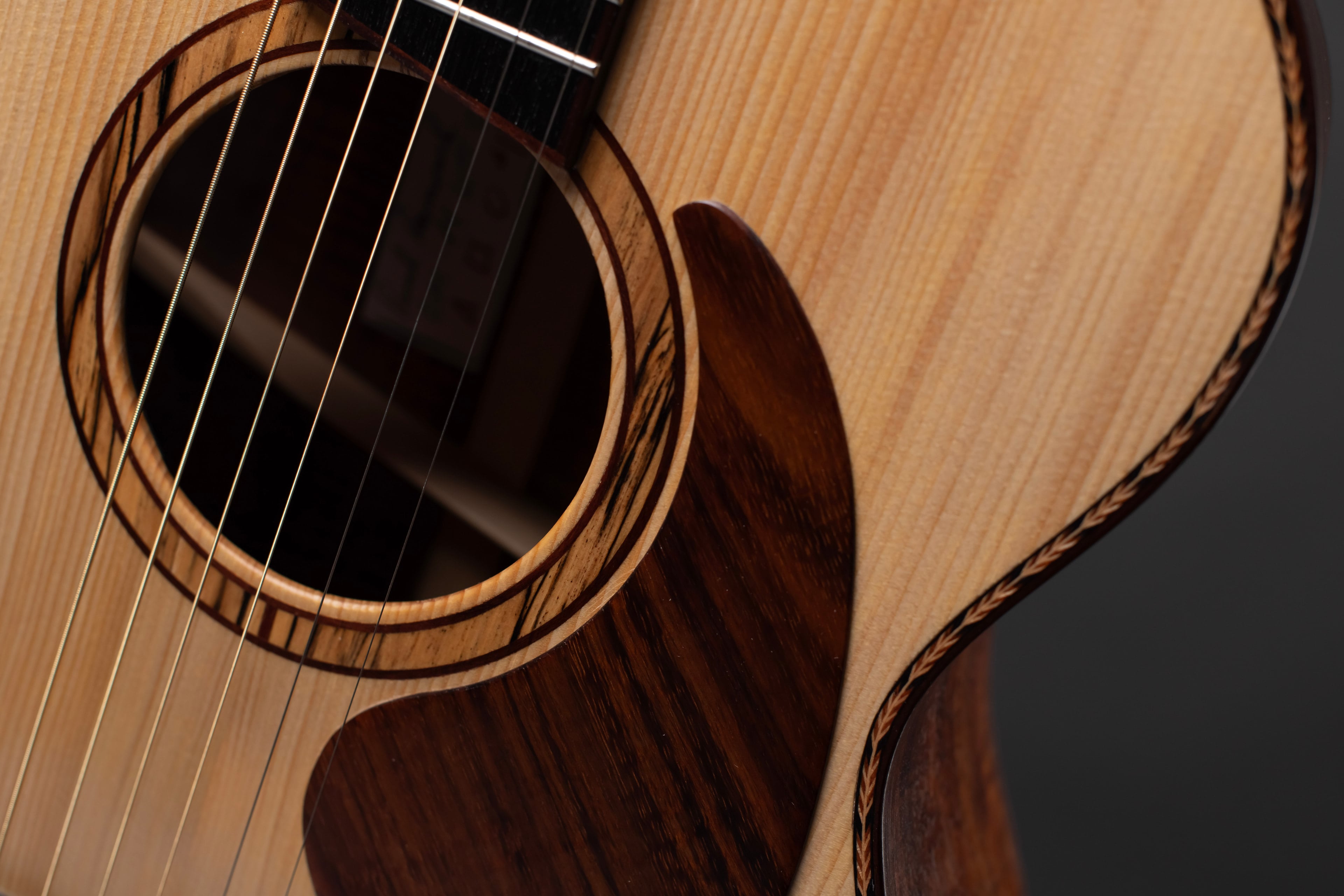 Raymond OM14 guitar detail - handcrafted acoustic instrument